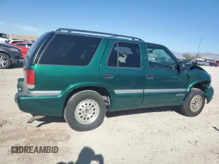 2000 GMC Jimmy SLE Convenience with VIN 1GKDT13W3Y2215035, listed as a Copart auction lot 77484104 with 116,124 mi miles and Salvage Title. Bid and sale history available at carsss.com. Image 3.