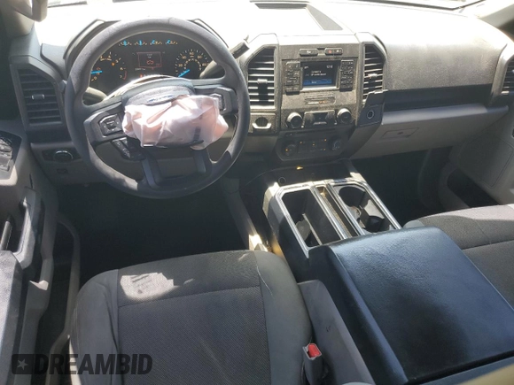 2016 Ford F-150 XL with VIN 1FTEW1CP0GKF41082, listed as a Copart auction lot 62001965 with 205,027 mi miles and Salvage title. Bid and sale history available at DreamBid. Image 8.
