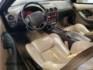 2000 Pontiac Firebird Formula z VIN 2G2FV22GXY2112840, wystawiony jako Copart lot #76244634 z przebiegiem 105 197 mil mil oraz Czysty tytuł • Clean title. Historia ofert i sprzedaży dostępna na DreamBid. Obrazek 8.