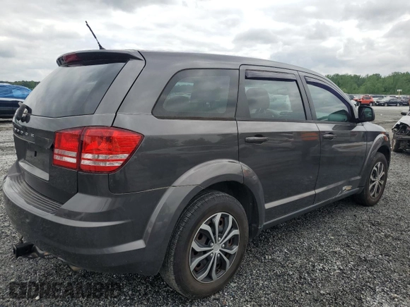 2015 Dodge Journey American Value z VIN 3C4PDCAB6FT649933, wystawiony jako Copart lot #54404415 z przebiegiem 144 830 mil mil oraz Szkoda całkowita • Salvage title. Historia ofert i sprzedaży dostępna na DreamBid. Obrazek 3.