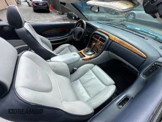 2001 Aston Martin Vantage z VIN SCFAB42321K402008, wystawiony jako Copart lot #59334855 z przebiegiem 60 444 mil mil oraz Szkody całkowita. Historia ofert i sprzedaży dostępna na DreamBid. Obrazek 5.