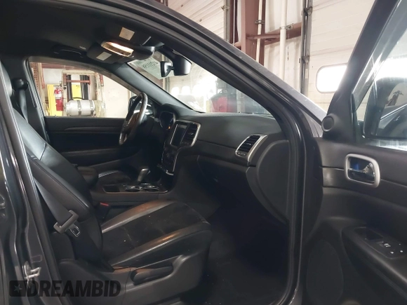 2018 Jeep Grand Cherokee Laredo E with VIN 1C4RJFAG5JC343101, listed as a IAAI auction lot 41211158 with 105,886 mi miles. Bid and sale history available at carsss.com. Image 5.
