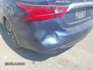 2016 Nissan Maxima SV z VIN 1N4AA6AP3GC386959, wystawiony jako IAAI lot #41886544 z przebiegiem 155 362 mil mil oraz . Historia ofert i sprzedaży dostępna na DreamBid. Obrazek 6.