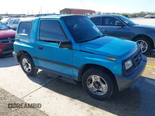 1997 Chevrolet Tracker z VIN 2CNBE1865V6904672, wystawiony jako IAAI lot #41296166 z przebiegiem 266 743 mil mil oraz . Historia ofert i sprzedaży dostępna na DreamBid. Obrazek 1.