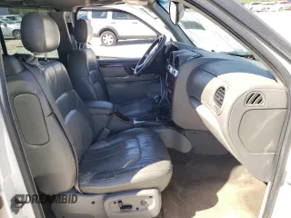 2003 GMC Envoy SLT z VIN 1GKET16SX36234308, wystawiony jako Copart lot #45653505 z przebiegiem 184 324 mil mil oraz Szkoda całkowita • Salvage title. Historia ofert i sprzedaży dostępna na DreamBid. Obrazek 7.