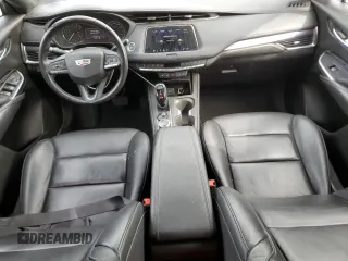 2022 Cadillac XT4 AWD Luxury with VIN 1GYFZBR46NF144622, listed as a Copart auction lot 51597195 with 29,304 mi miles and Salvage Title. Bid and sale history available at carsss.com. Image 8.