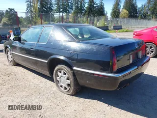 1998 Cadillac Eldorado Touring with VIN 1G6ET1295WU610253, listed as a IAAI auction lot 42066181 with 85,172 mi miles and . Bid and sale history available at DreamBid. Image 3.