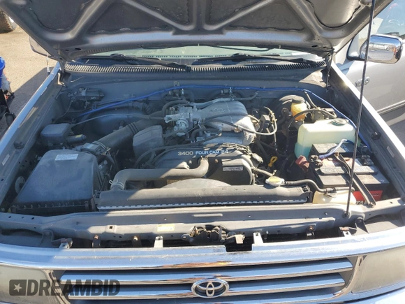 1995 Toyota T100 z VIN JT4VD22FXS0007824, wystawiony jako Copart lot #79159804 z przebiegiem 89 139 mil mil oraz Szkoda całkowita • Salvage title. Historia ofert i sprzedaży dostępna na DreamBid. Obrazek 11.