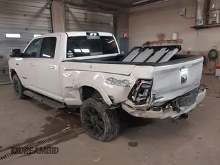 2022 Ram 2500 Laramie with VIN 3C6UR5FJ7NG253380, listed as a IAAI auction lot 41319536 with 33,945 mi miles. Bid and sale history available at carsss.com. Image 3.
