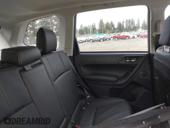 2015 Subaru Forester XT Touring with VIN JF2SJGWC1FH571301, listed as a IAAI auction lot 41682258 with 51,505 mi miles and . Bid and sale history available at DreamBid. Image 8.