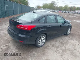 2017 Ford Focus SE with VIN 1FADP3F25HL239809, listed as a IAAI auction lot 42163669 with 140,220 mi miles and . Bid and sale history available at DreamBid. Image 4.