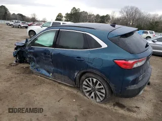 2020 Ford Escape Titanium z VIN 1FMCU9J91LUA73891, wystawiony jako Copart lot #89178475 z przebiegiem 35 579 mil mil oraz Szkoda całkowita • Salvage title. Historia ofert i sprzedaży dostępna na DreamBid. Obrazek 2.