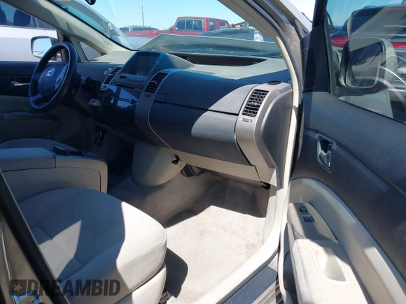 2007 Toyota Prius with VIN JTDKB20U977619909, listed as a IAAI auction lot 41829445 with 113,136 mi miles and . Bid and sale history available at carsss.com. Image 5.