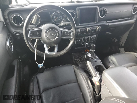 2020 Jeep Wrangler Unlimited Sahara with VIN 1C4HJXEN5LW207076, listed as a Copart auction lot 59461645 with 57,559 mi miles and Salvage title. Bid and sale history available at DreamBid. Image 8.
