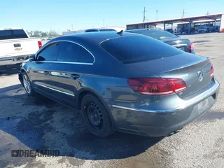 2014 Volkswagen CC R-Line with VIN WVWBN7AN1EE518173, listed as a IAAI auction lot 40895187 with 133,960 mi miles. Bid and sale history available at carsss.com. Image 3.
