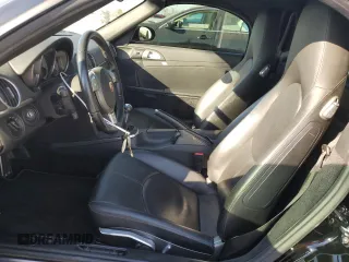 2005 Porsche Boxster S с VIN WP0CB29865U732015, выставлен на аукционе Copart как лот 42557885 с пробегом 15 886 миль миль и Списание • Salvage title. История ставок и продаж доступна на DreamBid. Изображение 7.