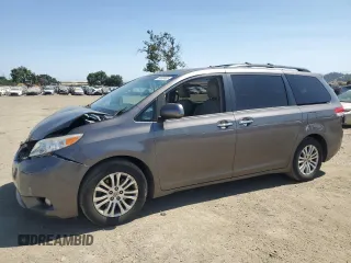 2013 Toyota Sienna XLE AAS with VIN 5TDYK3DC1DS341882, listed as a Copart auction lot 59592485 with 124,805 mi miles and Salvage title. Bid and sale history available at DreamBid. Image 1.
