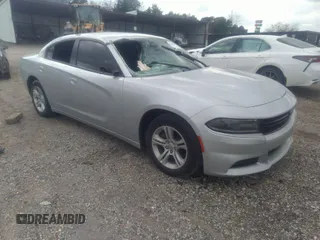 2021 Dodge Charger SXT with VIN 2C3CDXBG5MH642871, listed as a IAAI auction lot 41509420 with 100,789 mi miles. Bid and sale history available at carsss.com. Image 1.