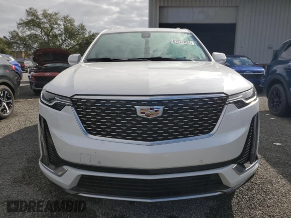 2021 Cadillac XT6 Premium Luxury z VIN 1GYKPCRSXMZ230618, wystawiony jako Copart lot #81022824 z przebiegiem Nie podano mil oraz Szkoda całkowita • Salvage title. Historia ofert i sprzedaży dostępna na DreamBid. Obrazek 5.