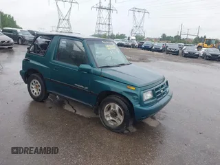 1996 Chevrolet Tracker z VIN 2CNBJ1860T6910906, wystawiony jako IAAI lot #42257309 z przebiegiem 206 888 mil mil oraz . Historia ofert i sprzedaży dostępna na DreamBid. Obrazek 1.