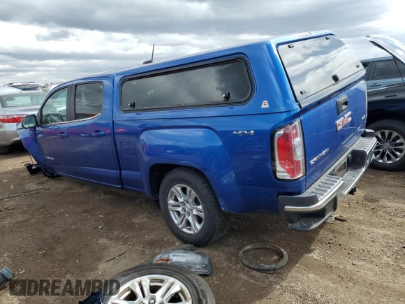 2019 GMC Canyon z VIN 1GTP6CE12K1174133, wystawiony jako Copart lot #51242875 z przebiegiem 182 902 mil mil oraz Szkoda całkowita • Salvage title. Historia ofert i sprzedaży dostępna na DreamBid. Obrazek 2.