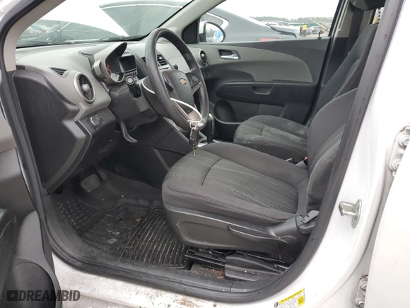 2016 Chevrolet Sonic LT with VIN 1G1JC5SH4G4159613, listed as a Copart auction lot 44979615 with 141,318 mi miles and Salvage Title. Bid and sale history available at carsss.com. Image 7.