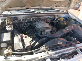 2002 Isuzu Rodeo S with VIN 4S2CK58WX24321556, listed as a IAAI auction lot 41405981 with 172,590 mi miles and . Bid and sale history available at DreamBid. Image 10.