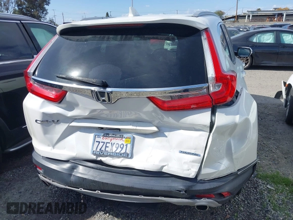 2017 Honda CR-V Touring with VIN 2HKRW1H96HH517669, listed as a IAAI auction lot 41653040 with 97,961 mi miles. Bid and sale history available at carsss.com. Image 17.