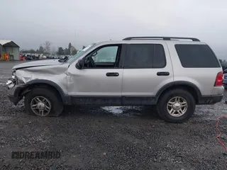 2003 Ford Explorer XLT z VIN 1FMZU73W13ZA42256, wystawiony jako IAAI lot #41234031 z przebiegiem Nie podano mil oraz . Historia ofert i sprzedaży dostępna na DreamBid. Obrazek 14.