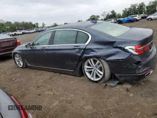 2016 BMW 7 Series 750i with VIN WBA7F0C54GGL99661, listed as a Copart auction lot 71742154 with 104,498 mi miles and Salvage Title. Bid and sale history available at carsss.com. Image 2.