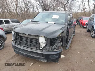 2019 Ram 1500 Big Horn/Lone Star with VIN 1C6RRFFG0KN733263, listed as a IAAI auction lot 41077579 with 85,259 mi miles. Bid and sale history available at carsss.com. Image 2.