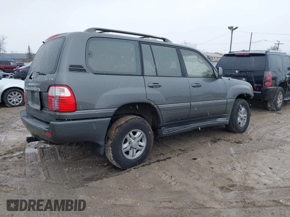 2000 Lexus LX 470 z VIN JT6HT00W8Y0092556, wystawiony jako IAAI lot #41727615 z przebiegiem 156 262 mil mil oraz . Historia ofert i sprzedaży dostępna na DreamBid. Obrazek 4.
