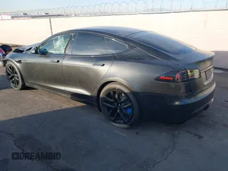 2022 Tesla Model S with VIN 5YJSA1E57NF493457, listed as a IAAI auction lot 41456284 with Not Provided miles and . Bid and sale history available at DreamBid. Image 3.