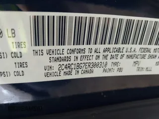 2014 Chrysler Town & Country Touring with VIN 2C4RC1BG7ER300310, listed as a IAAI auction lot 42048748 with 202,037 mi miles. Bid and sale history available at carsss.com. Image 9.