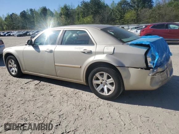 2006 Chrysler 300 Touring with VIN 2C3KA53G56H245851, listed as a Copart auction lot 52883105 with 166,410 mi miles and Salvage Title. Bid and sale history available at carsss.com. Image 2.