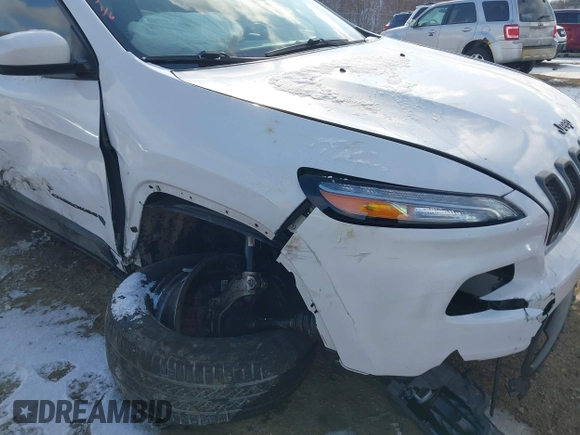 2015 Jeep Cherokee North with VIN 1C4PJMCS7FW792850, listed as a IAAI auction lot 41323432 with 102,642 mi miles. Bid and sale history available at carsss.com. Image 6.