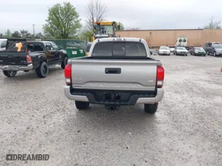 2020 Toyota Tacoma 4WD SR5 with VIN 3TMCZ5AN2LM300117, listed as a IAAI auction lot 41874864 with 59,594 mi miles. Bid and sale history available at carsss.com. Image 16.