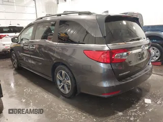 2018 Honda Odyssey Touring with VIN 5FNRL6H84JB041309, listed as a IAAI auction lot 42272247 with 90,371 mi miles and . Bid and sale history available at DreamBid. Image 3.