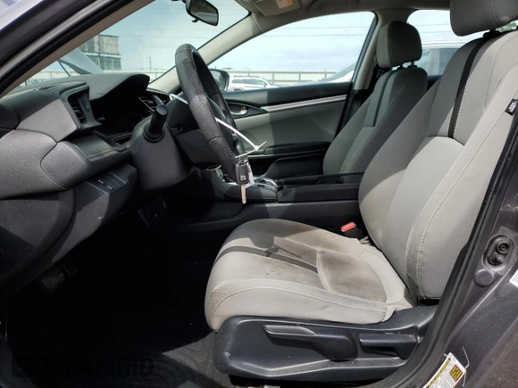 2017 Honda Civic LX z VIN 19XFC2F55HE214470, wystawiony jako Copart lot #57785675 z przebiegiem 81 862 mil mil oraz Szkoda całkowita • Salvage title. Historia ofert i sprzedaży dostępna na DreamBid. Obrazek 7.
