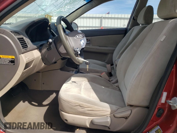 2009 Kia Spectra EX with VIN KNAFE221195634069, listed as a Copart auction lot 46187164 with 180,655 mi miles and Salvage Title. Bid and sale history available at carsss.com. Image 7.