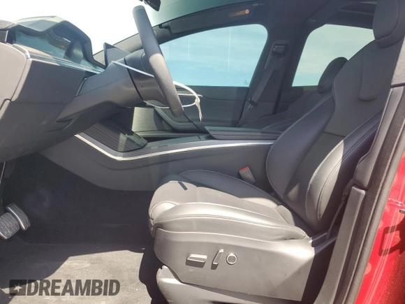 2023 Tesla Model X Plaid with VIN 7SAXCBE66PF427020, listed as a Copart auction lot 53890405 with 30,575 mi miles and Salvage Title. Bid and sale history available at DreamBid. Image 7.