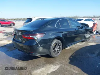 2021 Toyota Camry SE Nightshade with VIN 4T1G11AK5MU487725, listed as a IAAI auction lot 41196499 with 104,715 mi miles and . Bid and sale history available at DreamBid. Image 4.