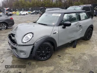 2021 MINI Hardtop Cooper with VIN WMWXR3C04M2N98103, listed as a Copart auction lot 42589255 with 61,317 mi miles and Salvage Title. Bid and sale history available at DreamBid. Image 1.