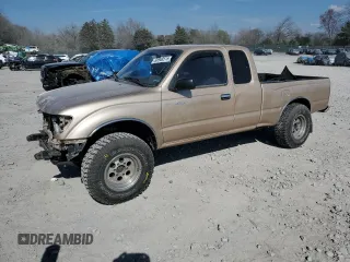 1999 Toyota Tacoma z VIN 4TAWN72N0XZ421196, wystawiony jako Copart lot #50948515 z przebiegiem 197 319 mil mil oraz Szkoda całkowita • Salvage title. Historia ofert i sprzedaży dostępna na DreamBid. Obrazek 1.