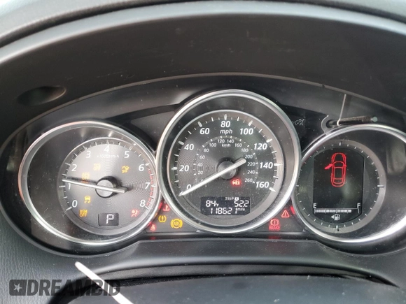 2015 Mazda CX-5 Grand Touring with VIN JM3KE4DY9F0516357, listed as a Copart auction lot 53156215 with 118,621 mi miles and Salvage Title. Bid and sale history available at DreamBid. Image 9.