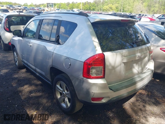 2011 Jeep Compass with VIN 1J4NT1FA1BD260206, listed as a IAAI auction lot 41917357 with 156,168 mi miles. Bid and sale history available at carsss.com. Image 3.