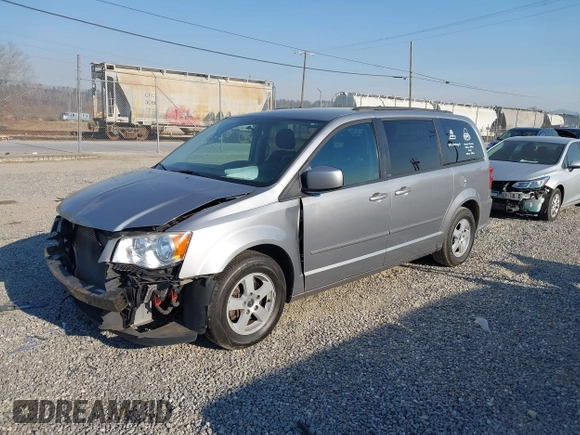 2013 Dodge Grand Caravan SXT with VIN 2C4RDGCG3DR553217, listed as a IAAI auction lot 41898964 with 101,989 mi miles and . Bid and sale history available at DreamBid. Image 2.