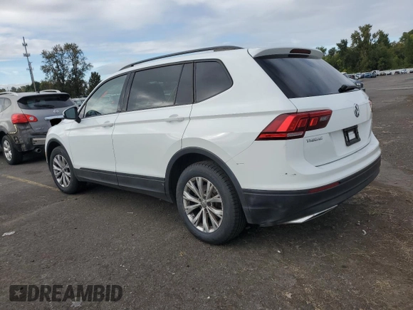 2018 Volkswagen Tiguan S with VIN 3VV0B7AX6JM111232, listed as a Copart auction lot 74944624 with 106,979 mi miles and Salvage Title. Bid and sale history available at DreamBid. Image 2.
