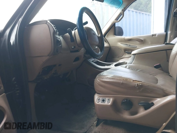 1998 Ford Expedition XLT with VIN 1FMRU176XWLB30950, listed as a IAAI auction lot 42704595 with 303,838 mi miles and . Bid and sale history available at DreamBid. Image 5.