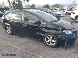 2017 Toyota Prius v Two with VIN JTDZN3EU1HJ066102, listed as a IAAI auction lot 41429125 with 168,152 mi miles. Bid and sale history available at carsss.com. Image 1.
